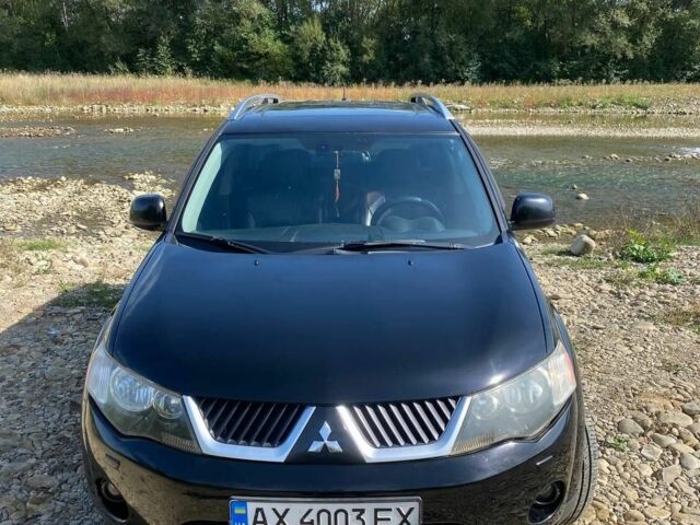 Черный Мицубиси Аутлендер, объемом двигателя 3 л и пробегом 150 тыс. км за 400 $, фото 2 на Automoto.ua