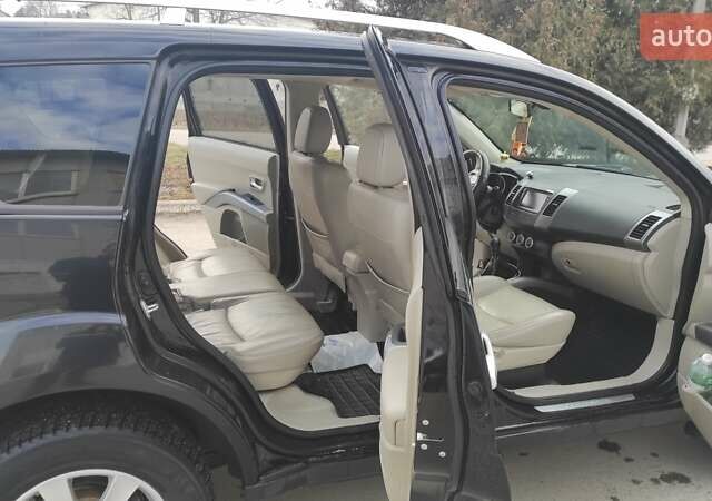 Чорний Міцубісі Аутлендер, об'ємом двигуна 2.2 л та пробігом 275 тис. км за 9900 $, фото 10 на Automoto.ua