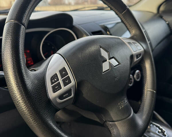 Чорний Міцубісі Аутлендер, об'ємом двигуна 2.36 л та пробігом 293 тис. км за 7900 $, фото 11 на Automoto.ua