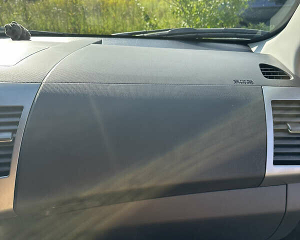 Черный Мицубиси Аутлендер, объемом двигателя 2.36 л и пробегом 240 тыс. км за 9599 $, фото 27 на Automoto.ua