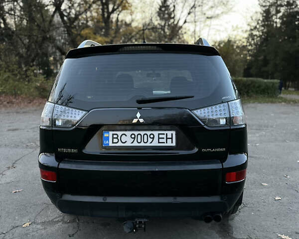 Чорний Міцубісі Аутлендер, об'ємом двигуна 1.97 л та пробігом 300 тис. км за 8600 $, фото 4 на Automoto.ua