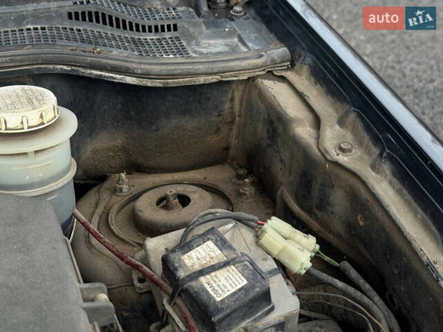 Черный Мицубиси Аутлендер, объемом двигателя 2 л и пробегом 240 тыс. км за 5500 $, фото 22 на Automoto.ua