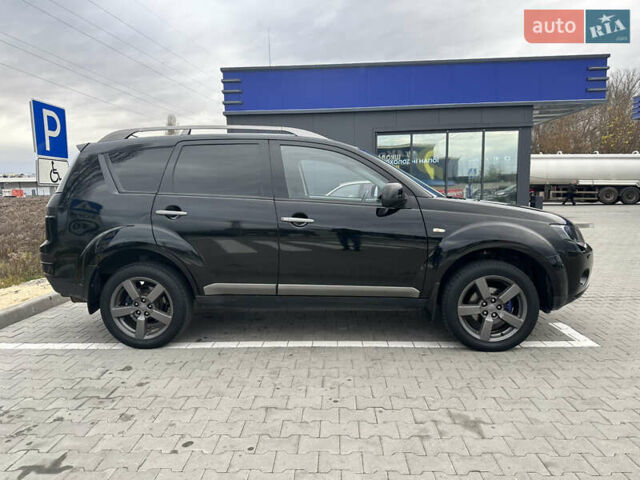 Чорний Міцубісі Аутлендер, об'ємом двигуна 2.4 л та пробігом 218 тис. км за 10000 $, фото 7 на Automoto.ua