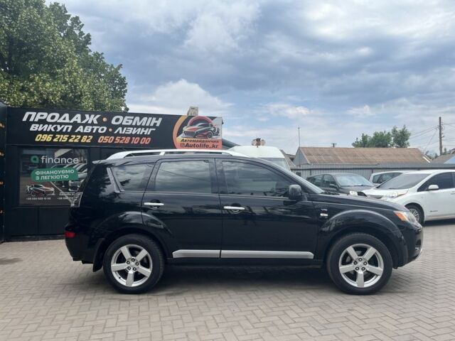 Черный Мицубиси Аутлендер, объемом двигателя 3 л и пробегом 235 тыс. км за 9800 $, фото 2 на Automoto.ua