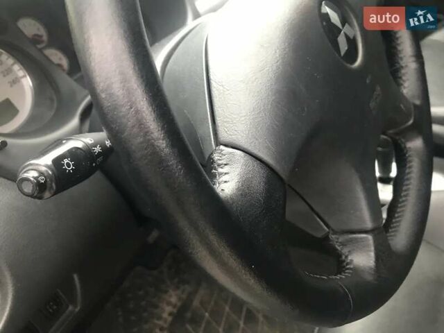 Чорний Міцубісі Аутлендер, об'ємом двигуна 2.38 л та пробігом 207 тис. км за 7000 $, фото 16 на Automoto.ua