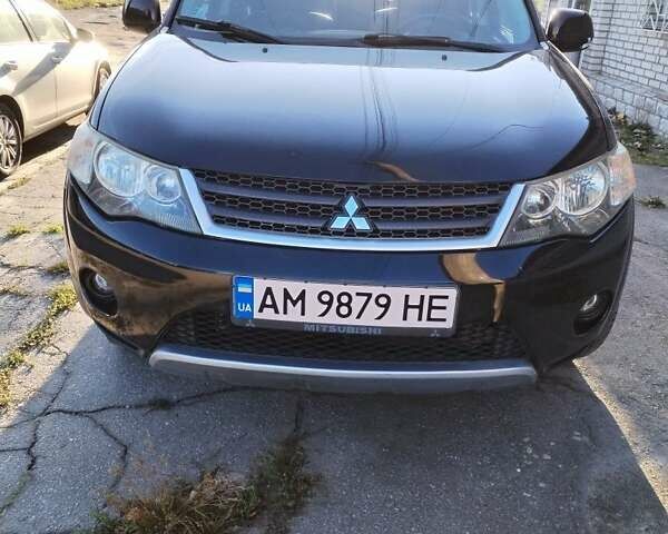 Черный Мицубиси Аутлендер, объемом двигателя 2.4 л и пробегом 199 тыс. км за 9000 $, фото 7 на Automoto.ua