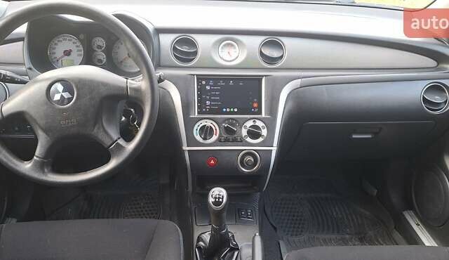 Міцубісі Аутлендер 2008 у Галиче на Automoto.ua Чорний Міцубісі Аутлендер, об'ємом двигуна 2 л та пробігом 112 тис. км за 7350 $, фото 8 на Automoto.ua