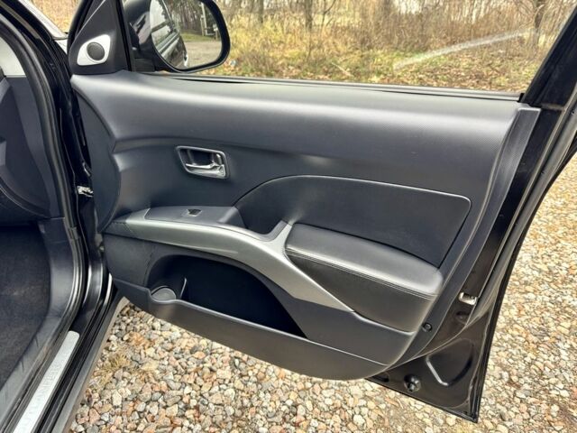 Чорний Міцубісі Аутлендер, об'ємом двигуна 2.4 л та пробігом 229 тис. км за 9790 $, фото 18 на Automoto.ua