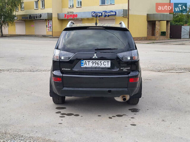 Чорний Міцубісі Аутлендер, об'ємом двигуна 2.4 л та пробігом 205 тис. км за 8400 $, фото 5 на Automoto.ua