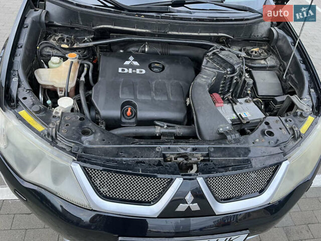 Черный Мицубиси Аутлендер, объемом двигателя 1.97 л и пробегом 244 тыс. км за 8800 $, фото 19 на Automoto.ua