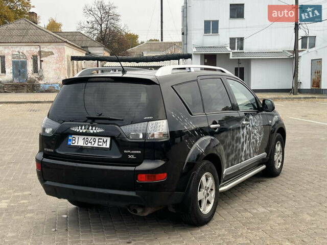 Мицубиси Аутлендер 2008 в Кременчуге на Automoto.ua Черный Мицубиси Аутлендер, объемом двигателя 2.4 л и пробегом 230 тыс. км за 6850 $, фото 12 на Automoto.ua