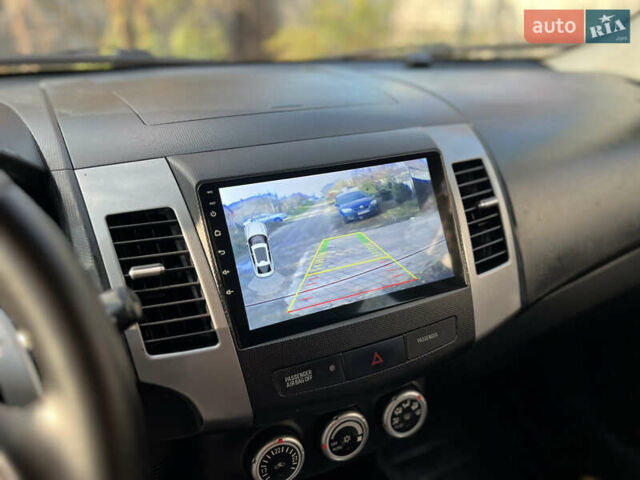 Чорний Міцубісі Аутлендер, об'ємом двигуна 2.4 л та пробігом 221 тис. км за 8900 $, фото 21 на Automoto.ua