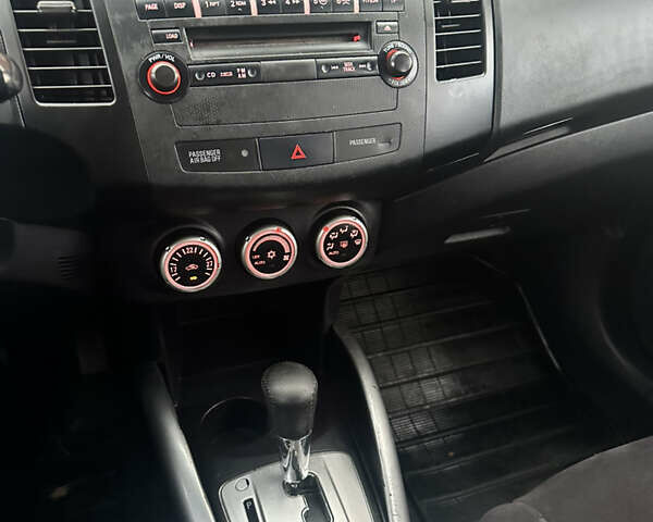 Черный Мицубиси Аутлендер, объемом двигателя 2.4 л и пробегом 199 тыс. км за 8777 $, фото 12 на Automoto.ua