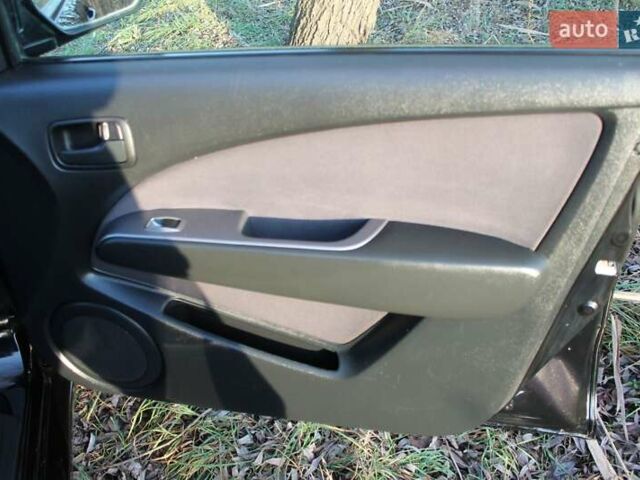 Черный Мицубиси Аутлендер, объемом двигателя 2 л и пробегом 189 тыс. км за 7200 $, фото 54 на Automoto.ua