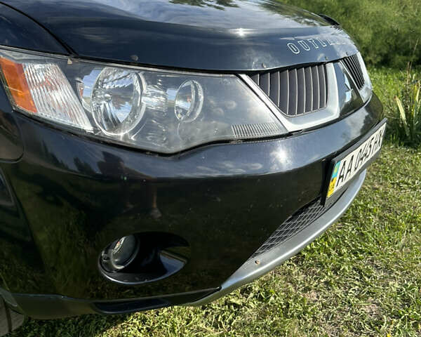 Черный Мицубиси Аутлендер, объемом двигателя 2.36 л и пробегом 240 тыс. км за 9599 $, фото 8 на Automoto.ua