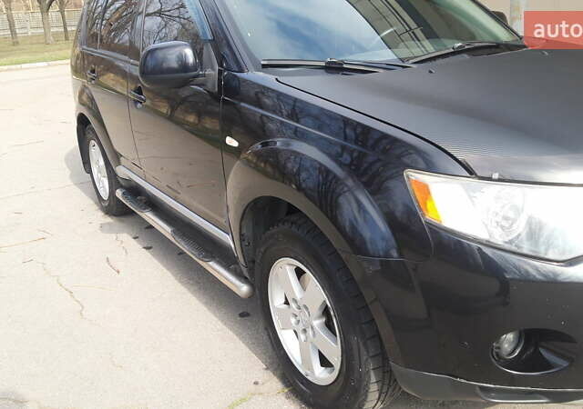 Чорний Міцубісі Аутлендер, об'ємом двигуна 2.36 л та пробігом 277 тис. км за 8500 $, фото 3 на Automoto.ua