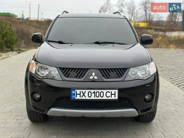 Черный Мицубиси Аутлендер, объемом двигателя 3 л и пробегом 248 тыс. км за 9800 $, фото 1 на Automoto.ua