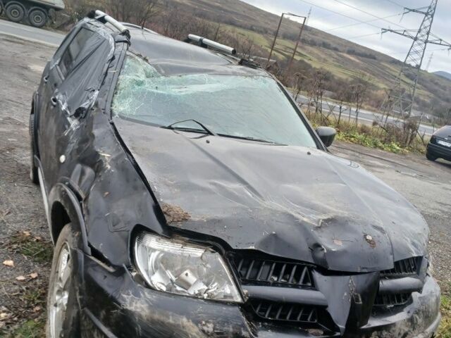 Чорний Міцубісі Аутлендер, об'ємом двигуна 0 л та пробігом 177 тис. км за 1700 $, фото 4 на Automoto.ua