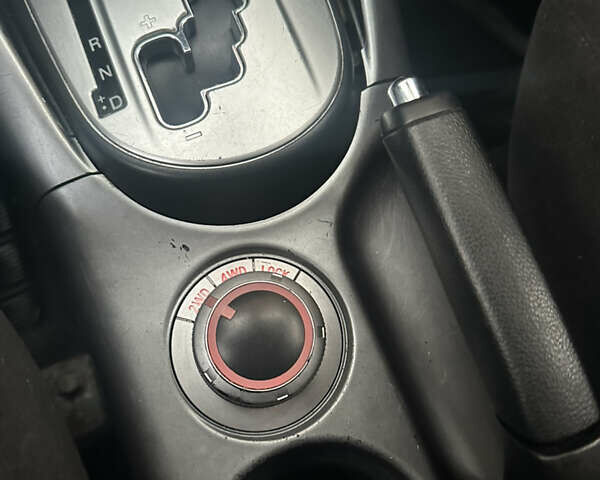 Черный Мицубиси Аутлендер, объемом двигателя 2.4 л и пробегом 199 тыс. км за 8777 $, фото 14 на Automoto.ua