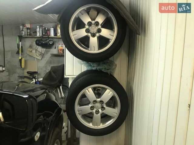 Чорний Міцубісі Аутлендер, об'ємом двигуна 2.38 л та пробігом 207 тис. км за 7000 $, фото 51 на Automoto.ua