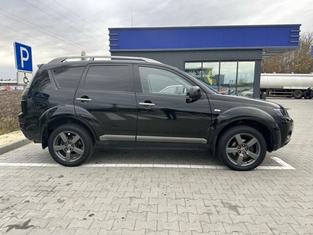 Чорний Міцубісі Аутлендер, об'ємом двигуна 2.4 л та пробігом 218 тис. км за 10000 $, фото 6 на Automoto.ua