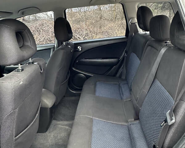 Чорний Міцубісі Аутлендер, об'ємом двигуна 2 л та пробігом 118 тис. км за 8100 $, фото 32 на Automoto.ua