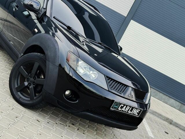 Черный Мицубиси Аутлендер, объемом двигателя 2.4 л и пробегом 199 тыс. км за 6470 $, фото 5 на Automoto.ua