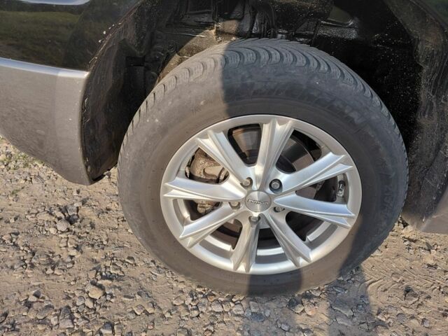 Черный Мицубиси Аутлендер, объемом двигателя 2 л и пробегом 143 тыс. км за 7800 $, фото 6 на Automoto.ua