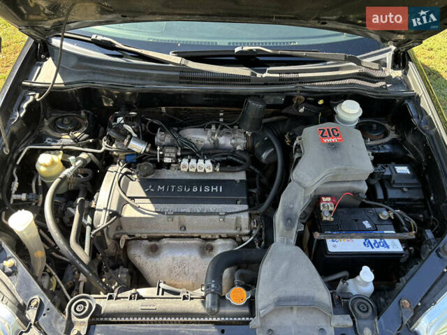 Міцубісі Аутлендер 2008 у Києві на Automoto.ua Чорний Міцубісі Аутлендер, об'ємом двигуна 2 л та пробігом 228 тис. км за 7300 $, фото 2 на Automoto.ua