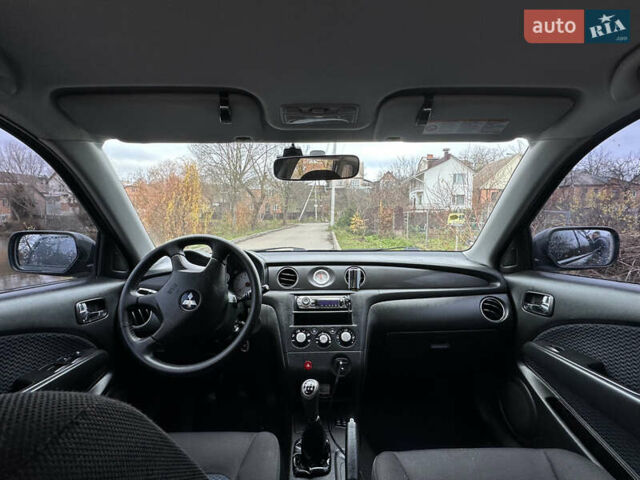 Чорний Міцубісі Аутлендер, об'ємом двигуна 2 л та пробігом 118 тис. км за 8100 $, фото 20 на Automoto.ua