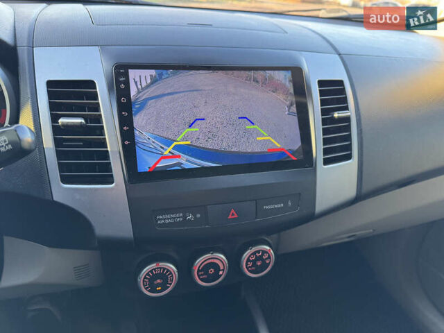 Чорний Міцубісі Аутлендер, об'ємом двигуна 3 л та пробігом 150 тис. км за 9499 $, фото 16 на Automoto.ua