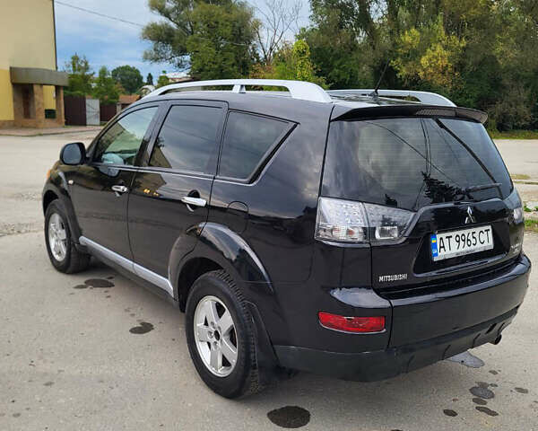 Чорний Міцубісі Аутлендер, об'ємом двигуна 2.4 л та пробігом 205 тис. км за 8400 $, фото 19 на Automoto.ua