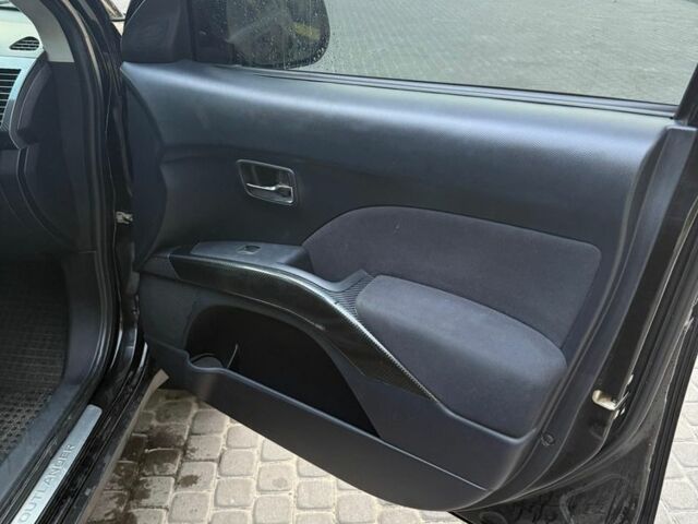 Черный Мицубиси Аутлендер, объемом двигателя 2.4 л и пробегом 369 тыс. км за 8500 $, фото 9 на Automoto.ua