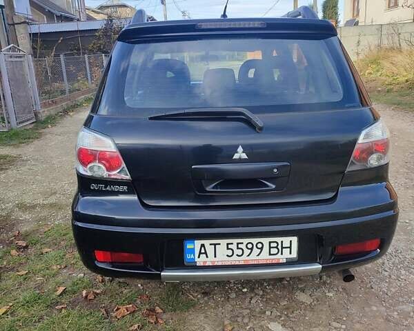 Міцубісі Аутлендер 2008 у Івано-Франківську на Automoto.ua Чорний Міцубісі Аутлендер, об'ємом двигуна 2 л та пробігом 128 тис. км за 7000 $, фото 22 на Automoto.ua