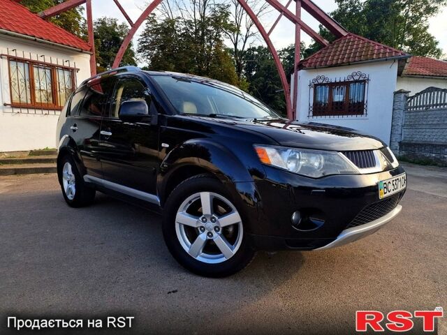 Черный Мицубиси Аутлендер, объемом двигателя 2.4 л и пробегом 189 тыс. км за 7000 $, фото 6 на Automoto.ua