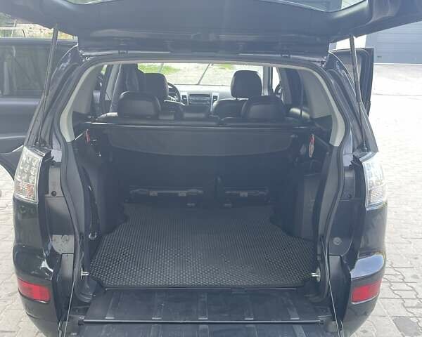 Черный Мицубиси Аутлендер, объемом двигателя 2.4 л и пробегом 290 тыс. км за 9500 $, фото 17 на Automoto.ua