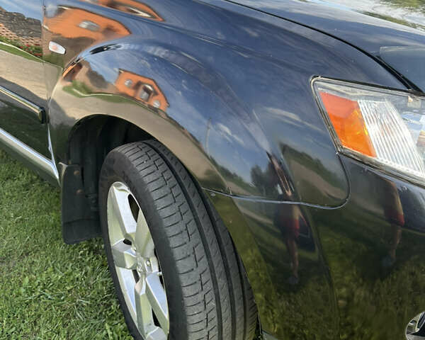 Черный Мицубиси Аутлендер, объемом двигателя 2.36 л и пробегом 240 тыс. км за 9599 $, фото 10 на Automoto.ua