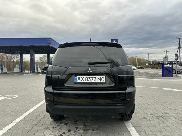 Чорний Міцубісі Аутлендер, об'ємом двигуна 2.4 л та пробігом 218 тис. км за 10000 $, фото 10 на Automoto.ua