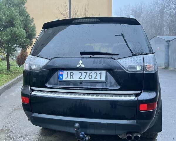 Чорний Міцубісі Аутлендер, об'ємом двигуна 2 л та пробігом 330 тис. км за 4900 $, фото 3 на Automoto.ua