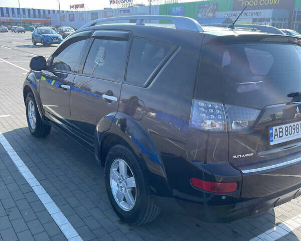 Чорний Міцубісі Аутлендер, об'ємом двигуна 2.4 л та пробігом 195 тис. км за 8600 $, фото 2 на Automoto.ua