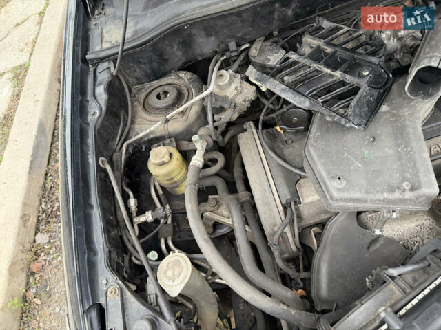 Черный Мицубиси Аутлендер, объемом двигателя 2 л и пробегом 200 тыс. км за 2999 $, фото 15 на Automoto.ua