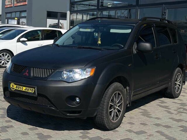 Черный Мицубиси Аутлендер, объемом двигателя 3 л и пробегом 308 тыс. км за 7600 $, фото 2 на Automoto.ua