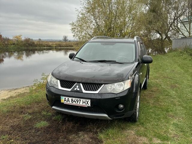 Чорний Міцубісі Аутлендер, об'ємом двигуна 2.4 л та пробігом 186 тис. км за 8700 $, фото 1 на Automoto.ua