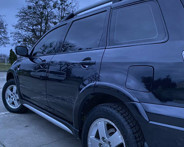 Чорний Міцубісі Аутлендер, об'ємом двигуна 2 л та пробігом 271 тис. км за 6799 $, фото 1 на Automoto.ua