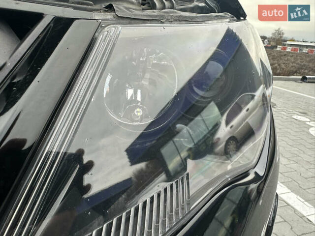 Чорний Міцубісі Аутлендер, об'ємом двигуна 2.4 л та пробігом 218 тис. км за 10000 $, фото 1 на Automoto.ua