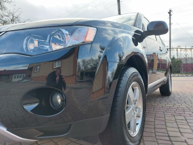 Черный Мицубиси Аутлендер, объемом двигателя 2 л и пробегом 249 тыс. км за 8750 $, фото 18 на Automoto.ua