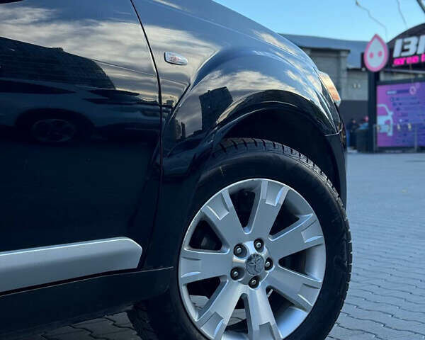 Черный Мицубиси Аутлендер, объемом двигателя 1.97 л и пробегом 202 тыс. км за 9700 $, фото 8 на Automoto.ua