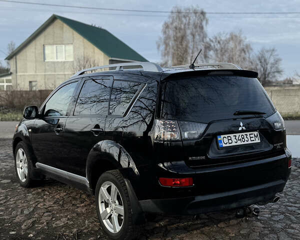 Чорний Міцубісі Аутлендер, об'ємом двигуна 2.36 л та пробігом 293 тис. км за 7900 $, фото 2 на Automoto.ua
