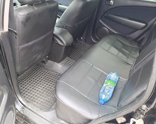 Мицубиси Аутлендер 2008 в Изюме на Automoto.ua Черный Мицубиси Аутлендер, объемом двигателя 2 л и пробегом 270 тыс. км за 7200 $, фото 3 на Automoto.ua