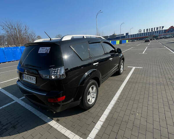 Чорний Міцубісі Аутлендер, об'ємом двигуна 2.4 л та пробігом 195 тис. км за 8600 $, фото 3 на Automoto.ua